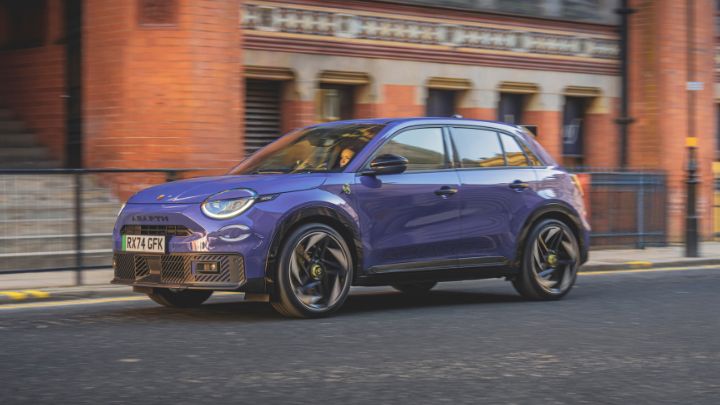 Blue Abarth Motability Car Driving On Road