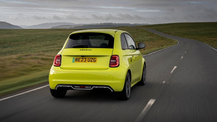 Exterior Rear of Acid Green Abarth 500e Driving