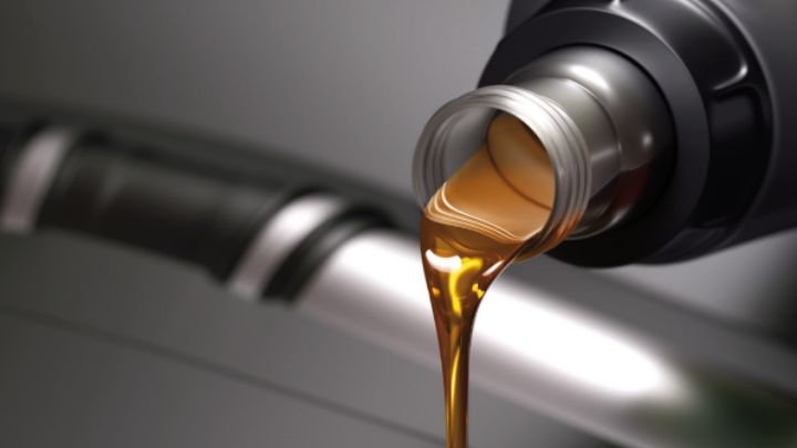 Car oil being poured