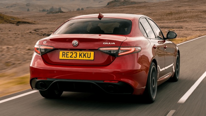 Red Alfa Romeo Giulia Exterior Rear Driving