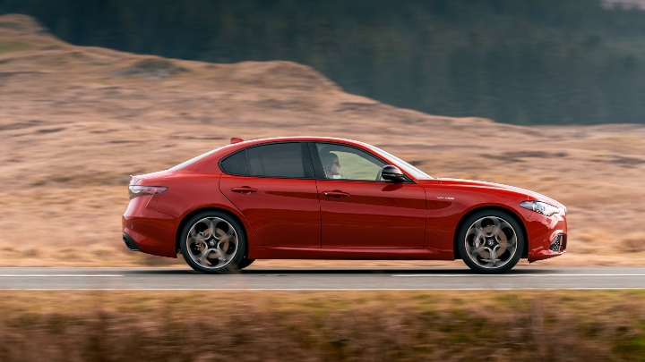 Red Alfa Romeo Giulia Exterior Side Driving