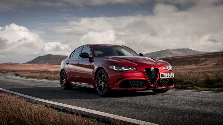 Red Alfa Romeo Giulia Quadrifoglio Exterior Front Driving