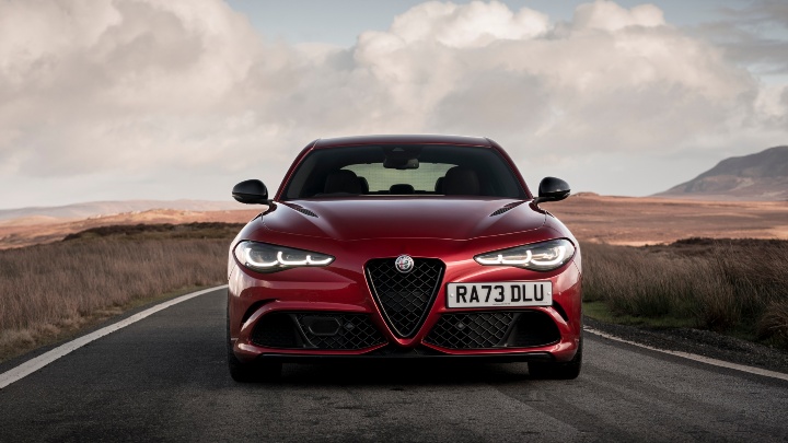 Red Alfa Romeo Giulia Quadrifoglio Exterior Front Driving