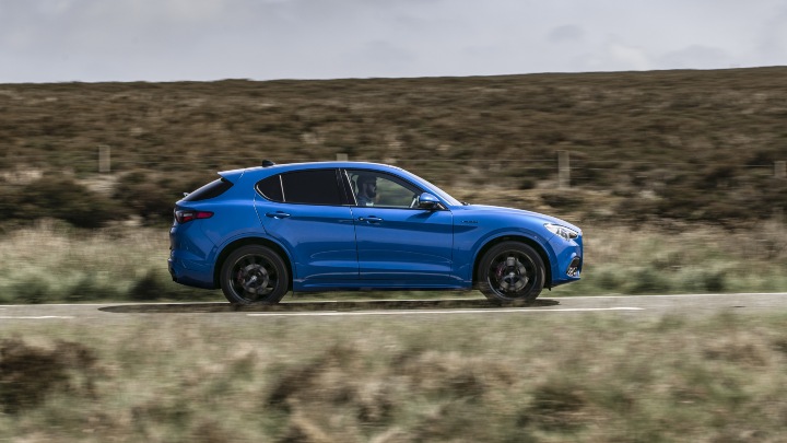 Blue Alfa Romeo Stelvio Exterior Side Driving