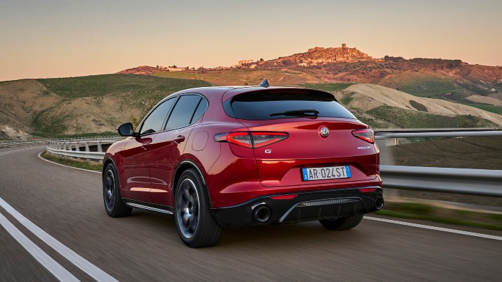 Red Alfa Romeo Stelvio Exterior Rear Driving