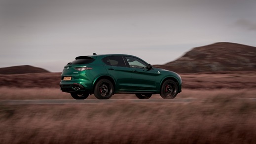 Green Alfa Romeo Stelvio Quadrifoglio Exterior Side Driving