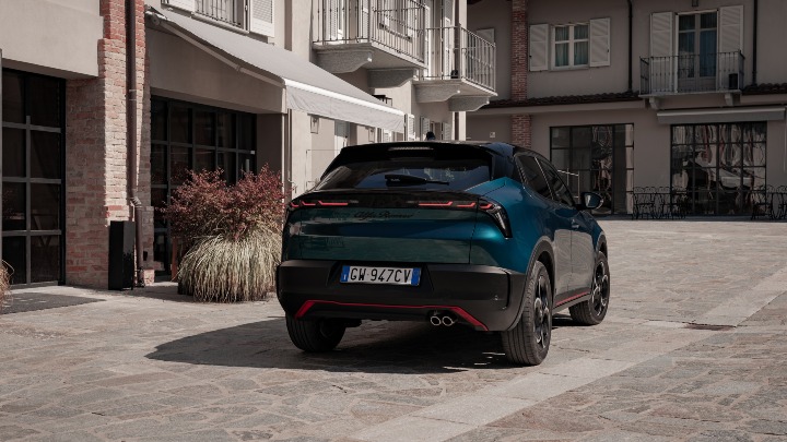 Alfa Romeo Junior Green rear city street