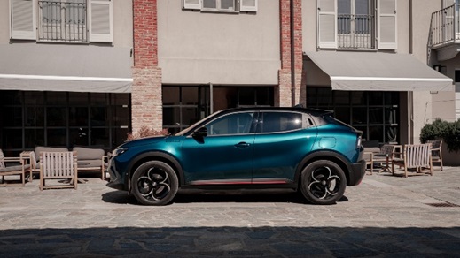 Alfa Romeo Junior Green side city street