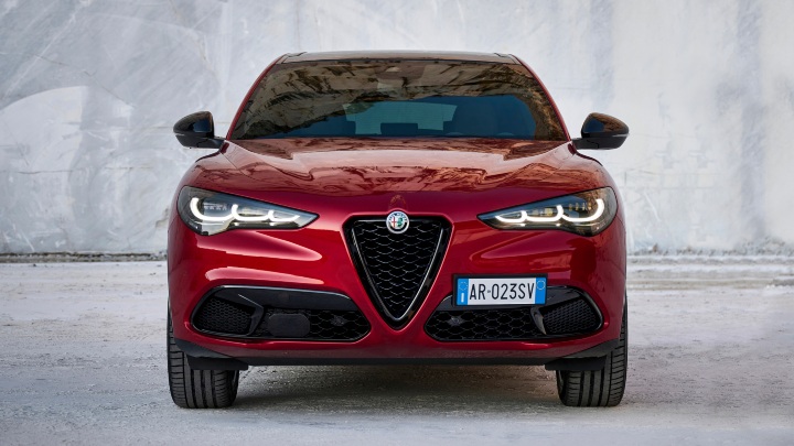 Red Alfa Romeo Stelvio straight on close up