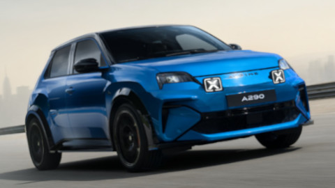 Blue Alpine A290 GTS parked in front of a city skyline