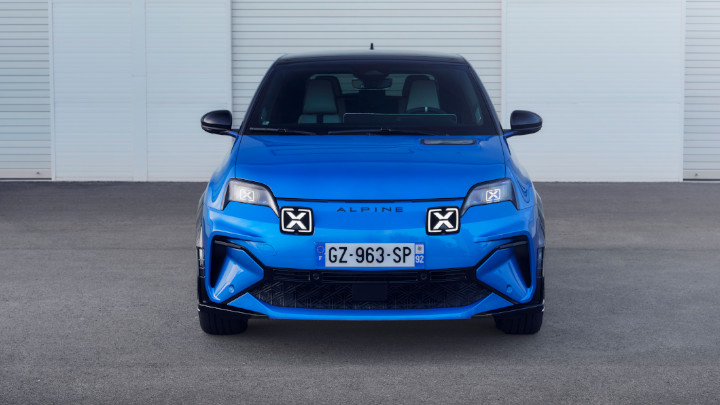 Blue Alpine A290 GTS parked in front of a white wall
