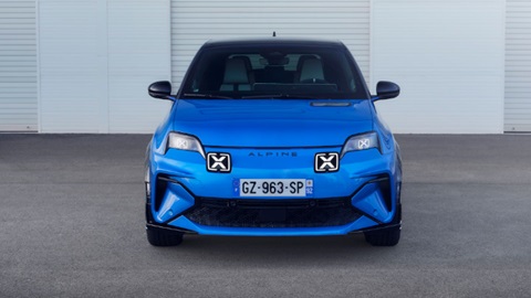 Blue Alpine A290 GTS parked in front of a white wall