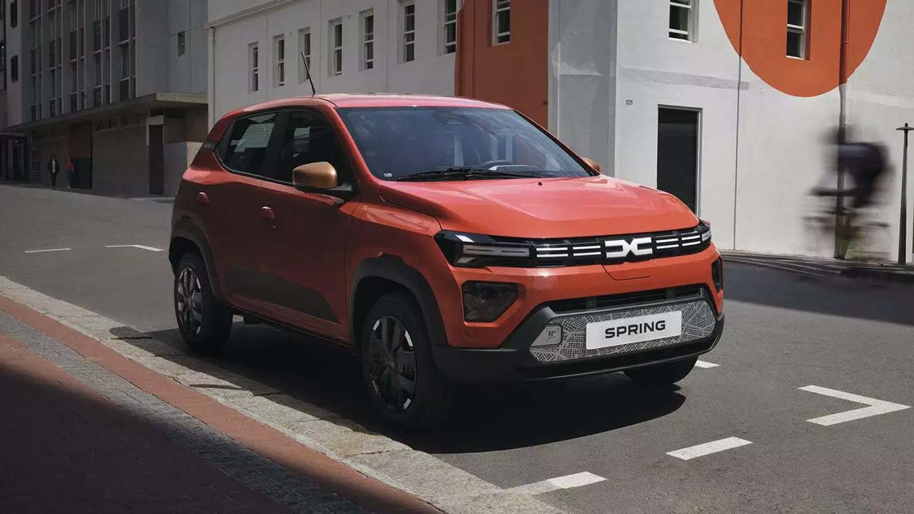 Red Dacia Spring Front Parked in On-Street Parking Spot