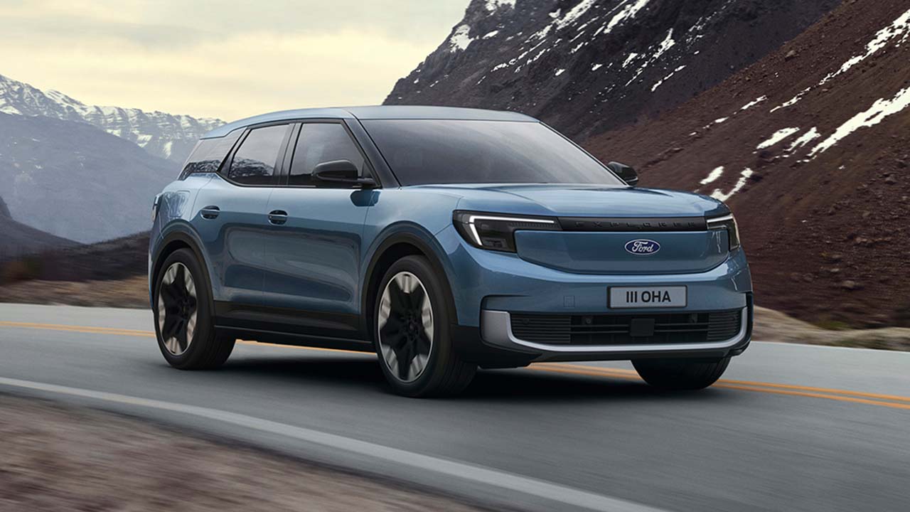 Blue Ford Explorer Front Driving On Road