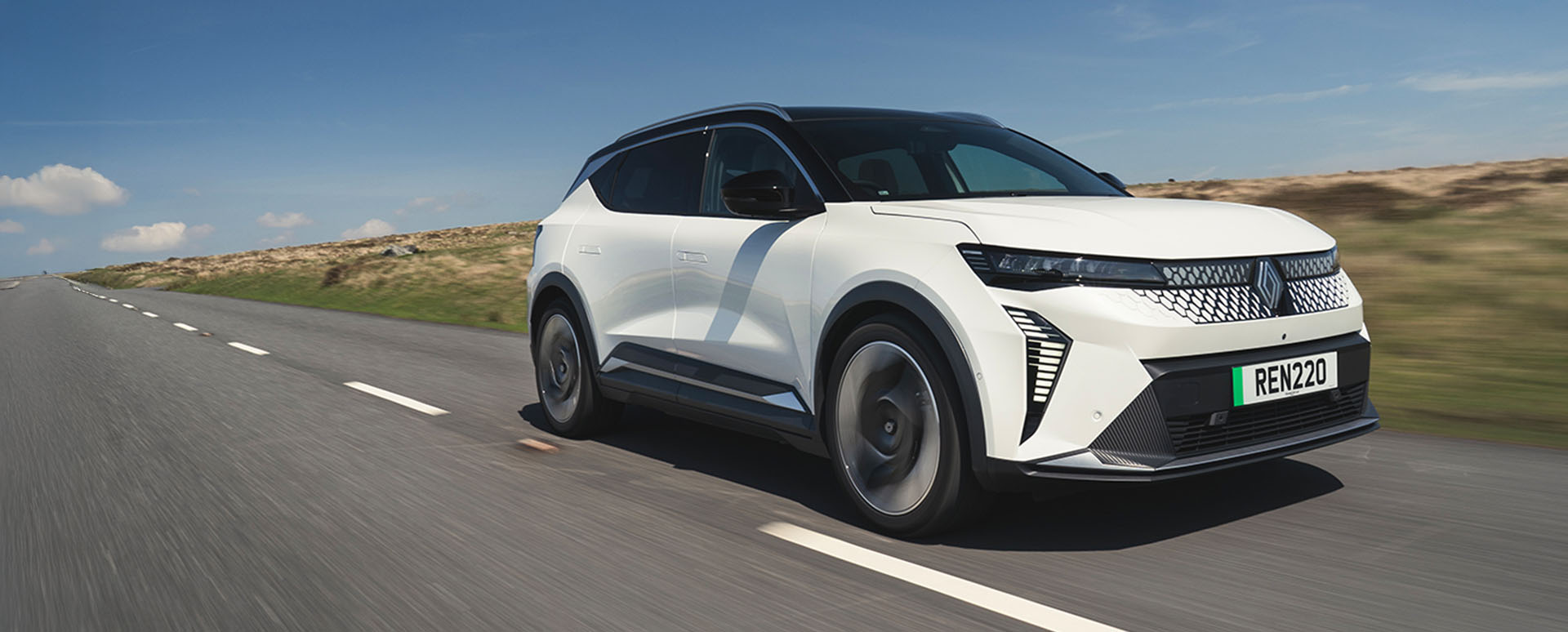 White Renault Scenic E-Tech Electric Driving On Road