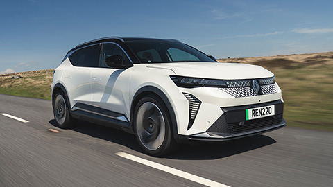 White Renault Scenic E-Tech Electric Driving On Road