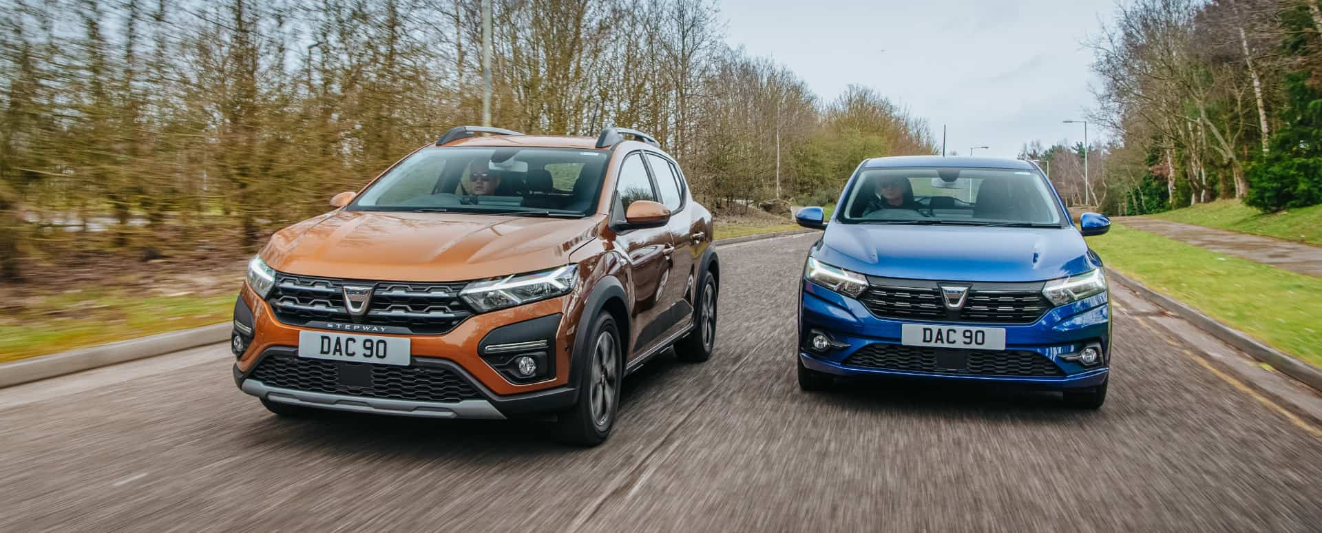 Orange Dacia Sandero Stepway and Blue Dacia Sandero