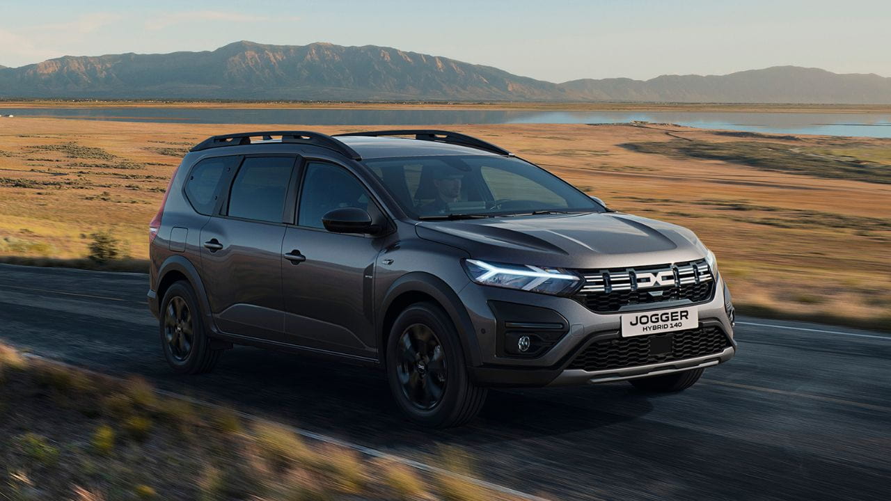Dark grey Dacia Jogger driving in the countryside