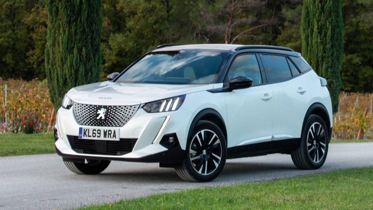 white peugeot 2008, front, parked