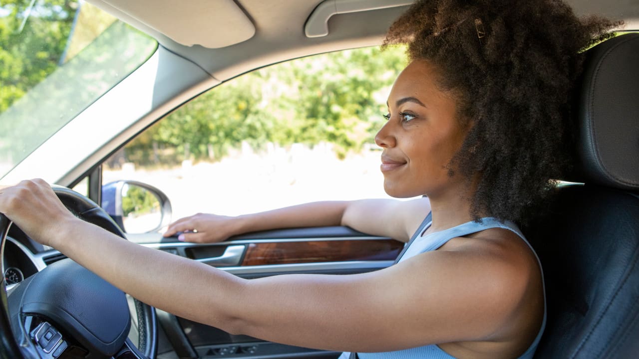 Young Woman Driving Car