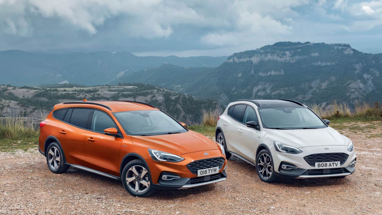Orange Ford Focus Active Estate and White Ford Focus Active Hatch