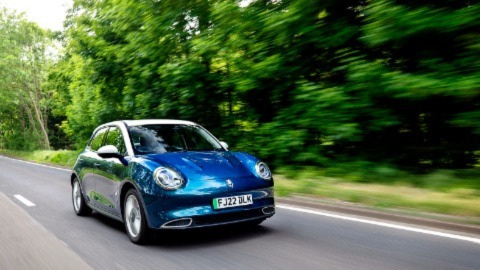 Blue car on a beautiful country road