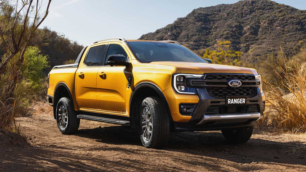 Yellow Ford Ranger Exterior Front Driving