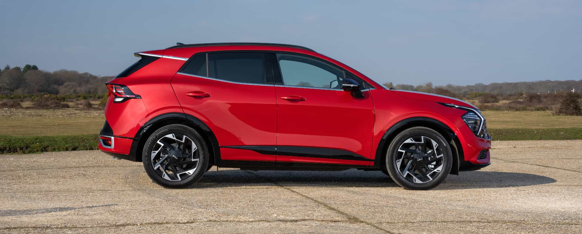 Kia Sportage AWD in Red Parked