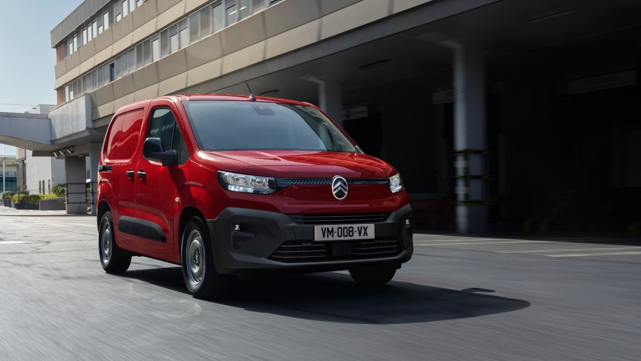 Citroen Berlingo van red driving