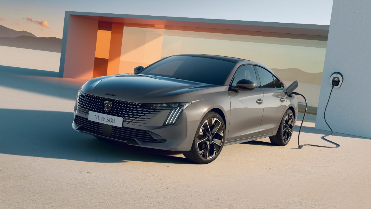 Grey Peugeot 508 charging