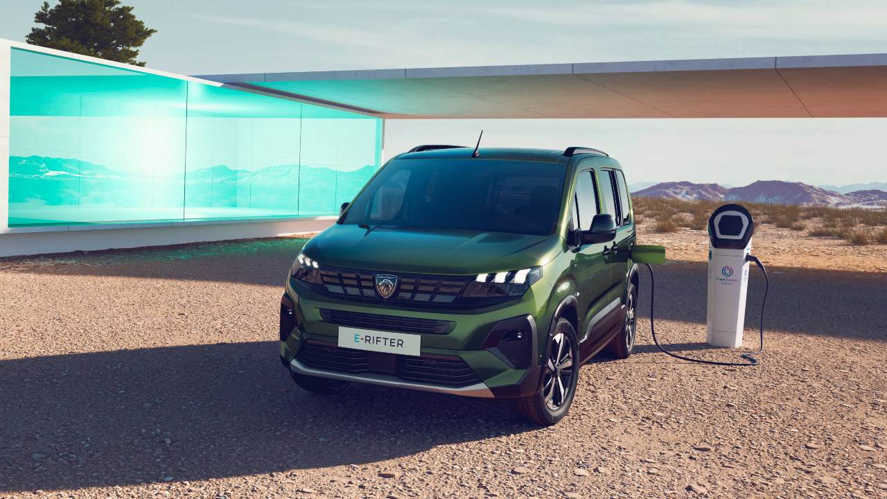 Green Peugeot E-Rifter charging