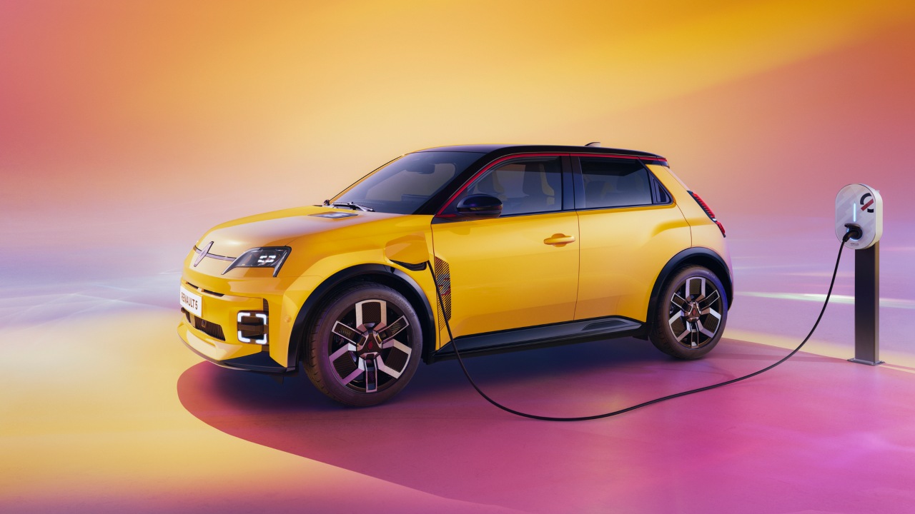Yellow Renault 5 charging