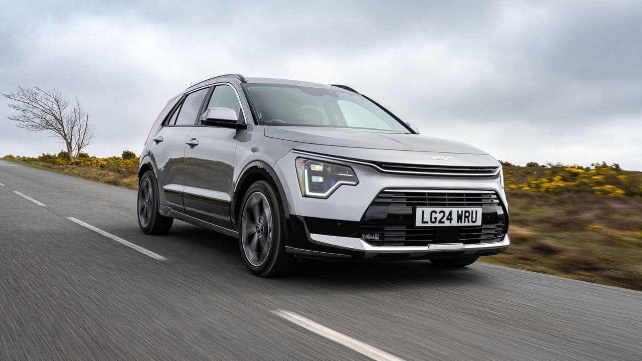 Kia Niro driving in the countryside