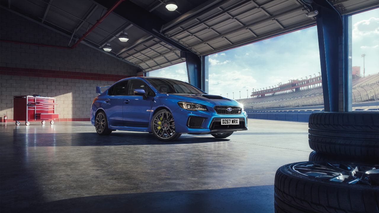 Blue Subaru WRX STI in garage