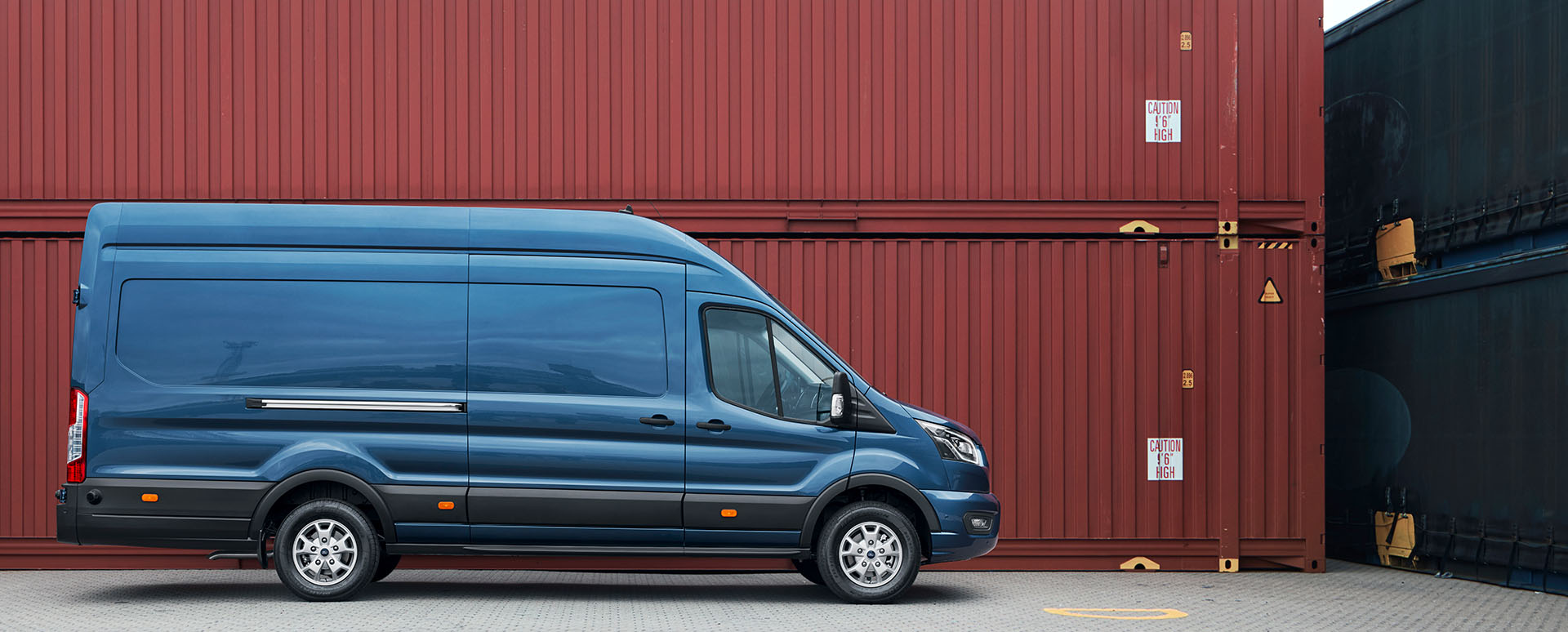 Blue Ford Transit side