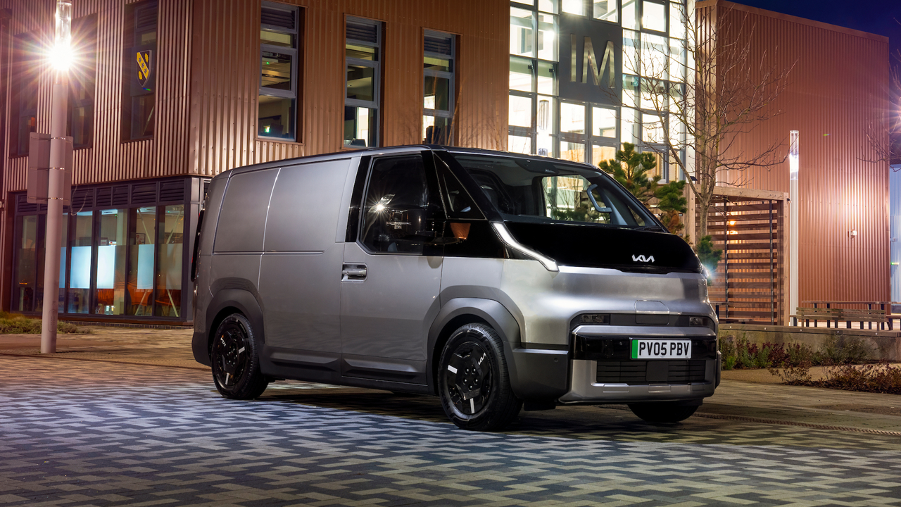 Kia PV5 Cargo near office building at night