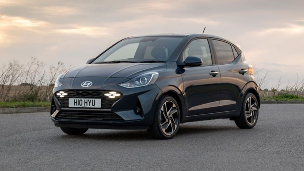 Black Hyundai i10 parked on the road