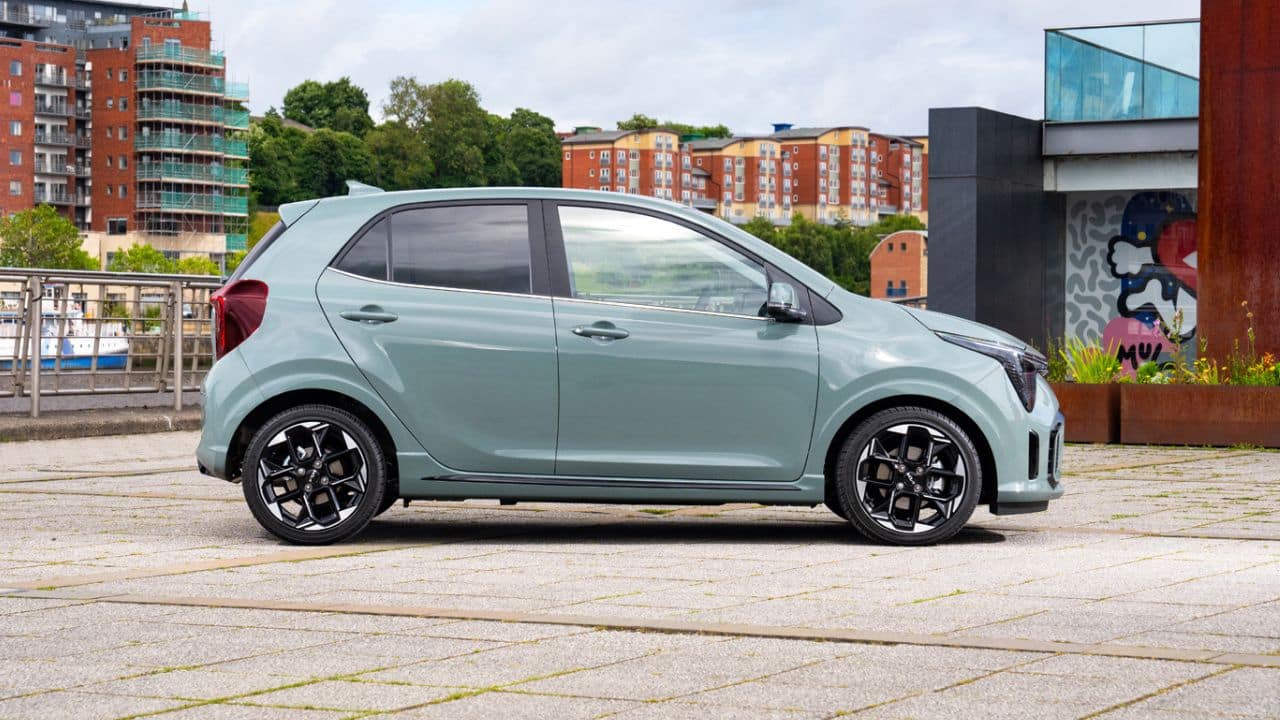 Blue Kia Picanto parked in the city