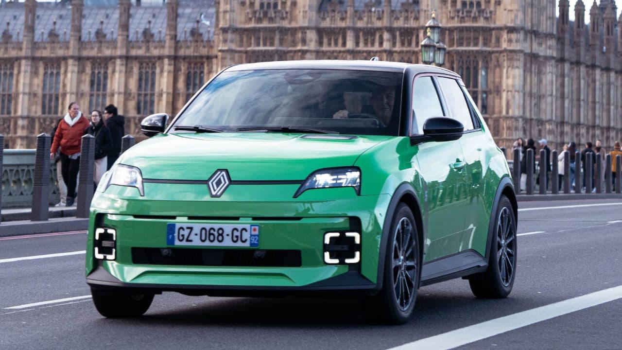 Green Renault 5 E-Tech driving in London