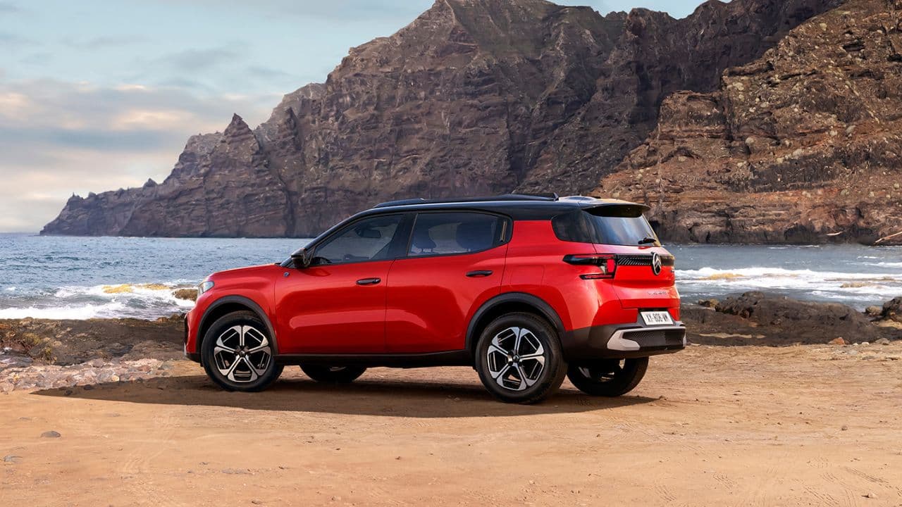 Red Citroen C3 on a beach