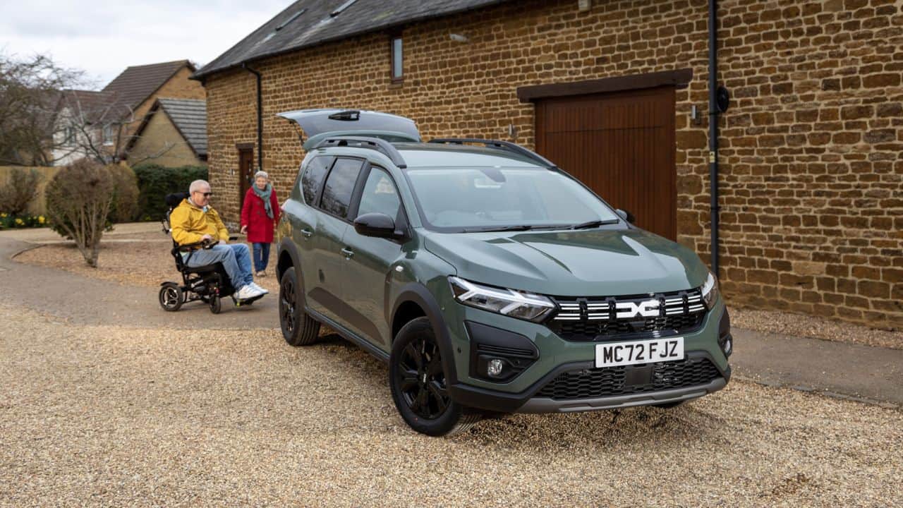 Green Jogger with the boot open
