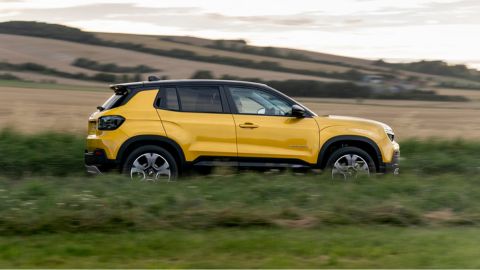 Yellow Jeep Avenger in the countryside