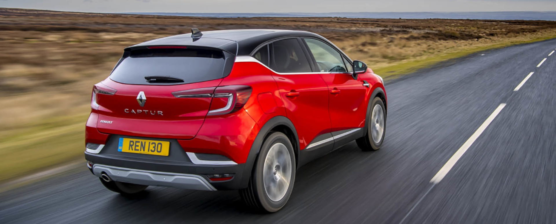 Red Renault Captur Exterior Rear Driving