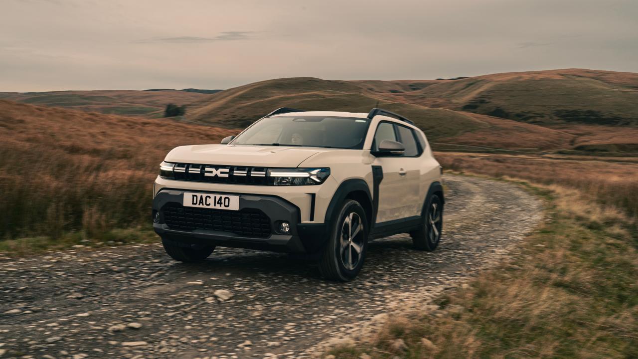 White Dacia Duster Exterior Front Driving Off-Road
