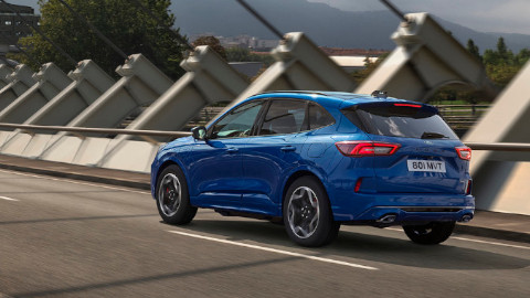 Blue Ford Kuga Rear Driving On Bridge