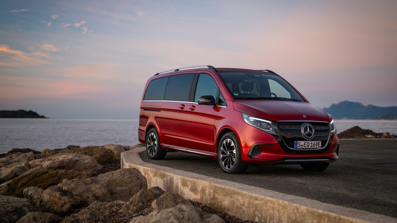 Red Mercedes-Benz V-Class static near water