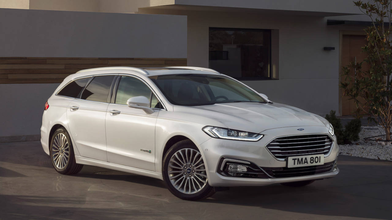 White Ford Mondeo Estate, parked