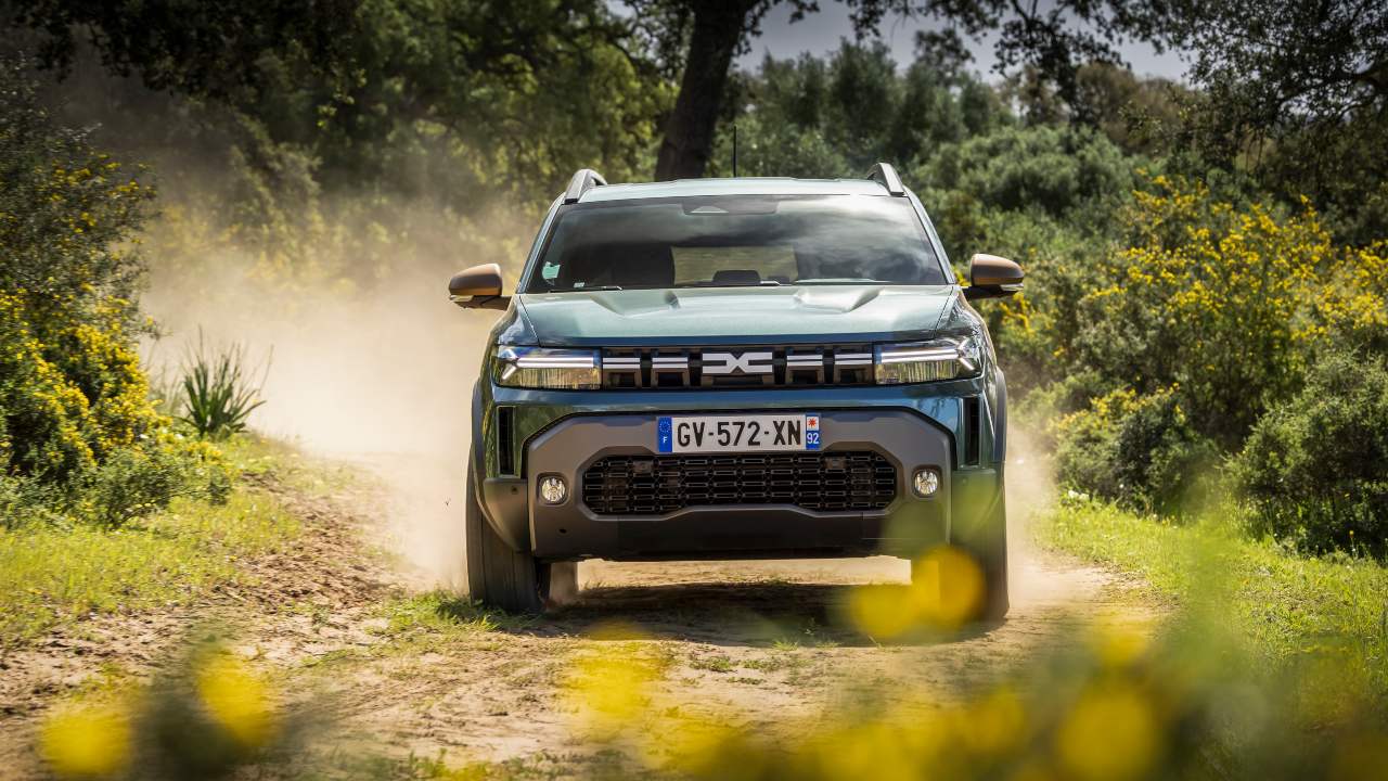 Dacia Duster driving front angle on dirt road