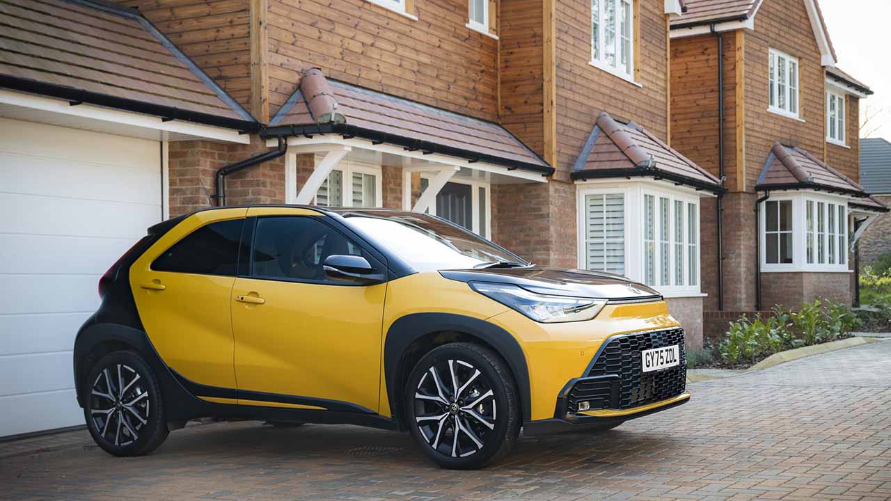 Toyota Aygo X parked on a driveway 