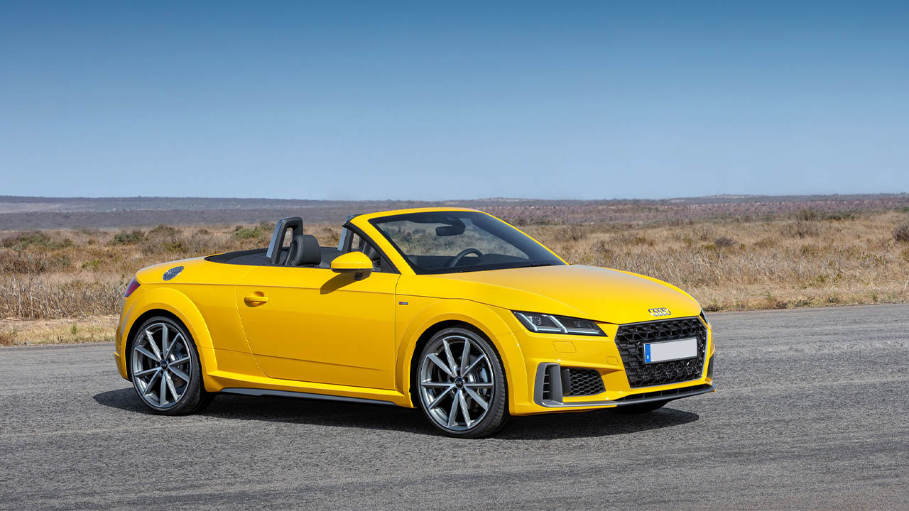 yellow audi tt roadster, parked